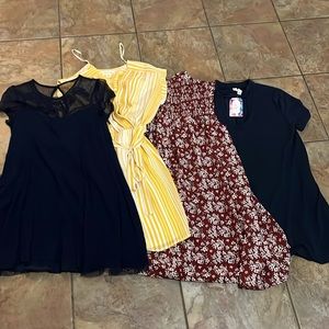 4 medium dresses for 25 ..sale sale like new some not worn